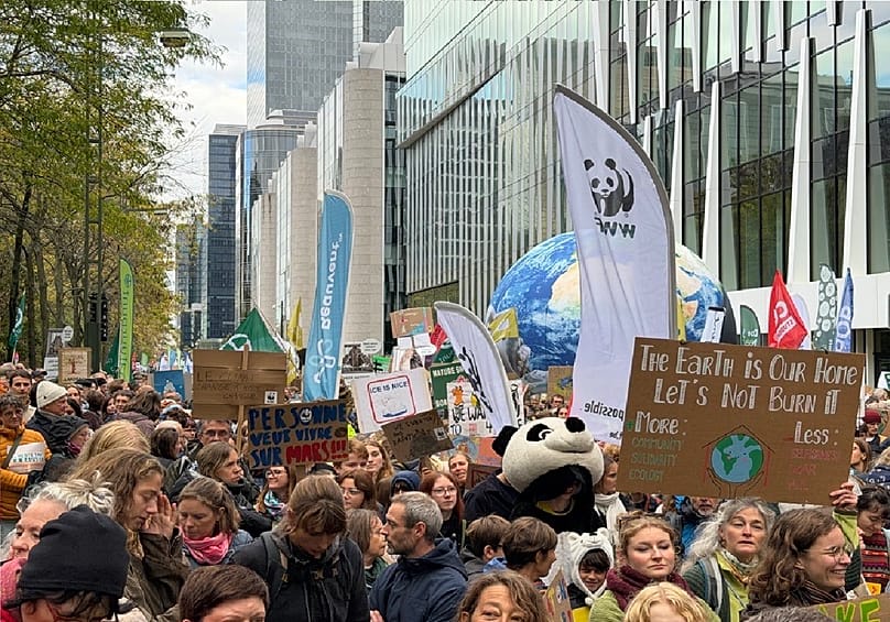 Protesters at the starting point of the climate march in Brussels, Belgium urging for action against climate change. Sunday Oct. 10, 2026.