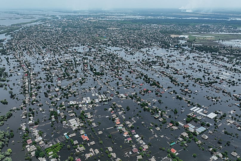 FILE - Houses are seen underwater in the flooded town of Oleshky, Ukraine, June 10, 2023 after Russian forces destroyed the Kakhovka Dam in Kherson region.