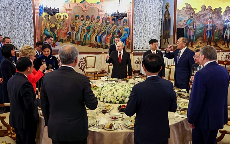 Vladimir Putin raises a toast during a state dinner in honour of Vietnamese President To Lam and his wife Ngo Phuong Li at the Kremlin, 9 September 2026