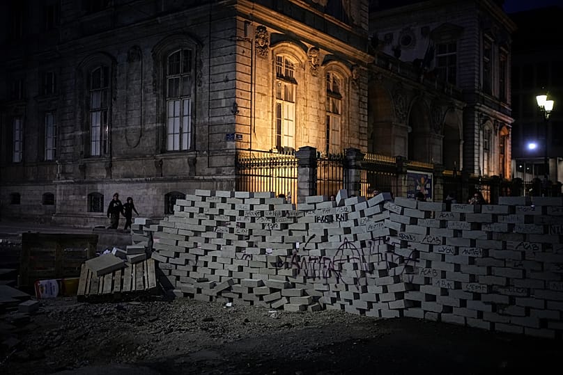 An improvised barricade near Lyon city hall on 17 October 2026.