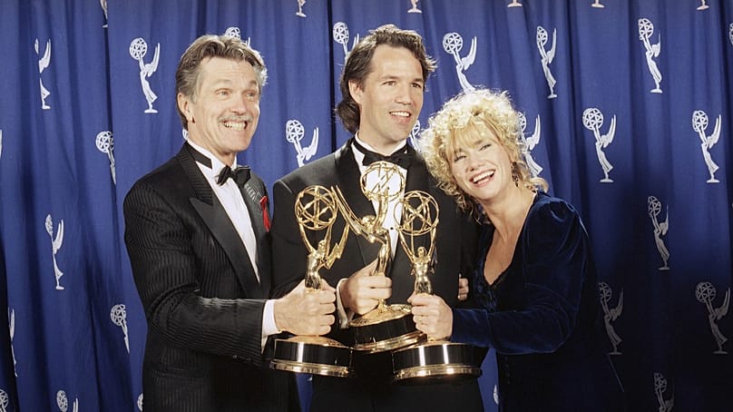 FILE: From left Tom Skerritt, with 'Picket Fences' creator David E. Kelley and Kathy Baker after winning best drama series at 45th Emmy Awards in California, 19 September 1993