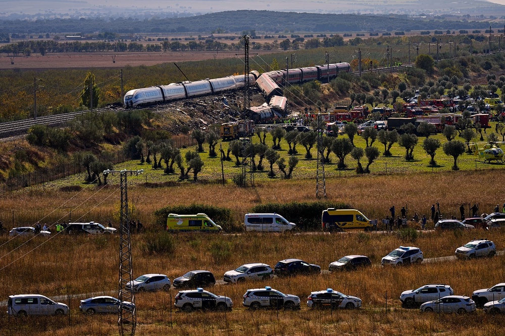 Emergency services work at the site of a collision between two trains in Urda, Spain, on Wednesday 28 October 2026. (AP Photo/Manu Fernández)