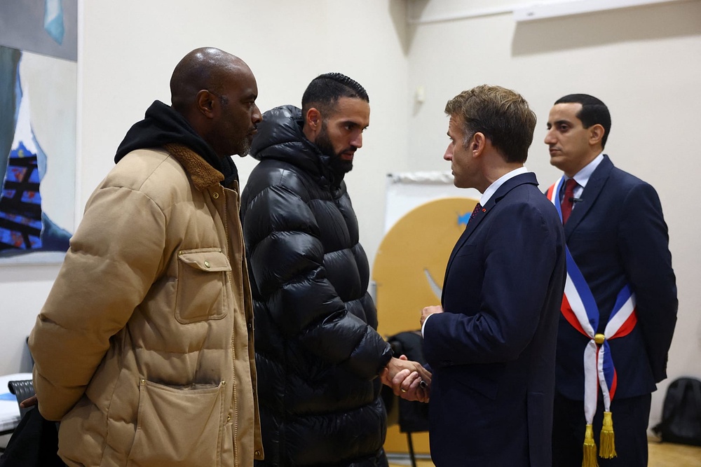 Emmanuel Macron meets residents at Trappes town hall on 23 October 2026