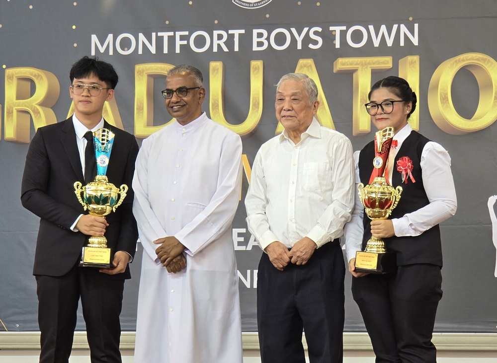 Scholars of the year proving that MBT continues to contribute to the development of Malaysia's skilled talent pipeline through practical, industry-focused vocational training. (From left): Looi Wen Ting, Brother Director Robin Devasagayam, Chairman of the Board of Governors Ir. Dr. Philip Tan Chee Lin, and Wan Kai Qing
