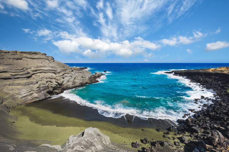 Image from: In the United States, this stunning beach is made of astonishing green sand (it’s one of the only ones in the world!)