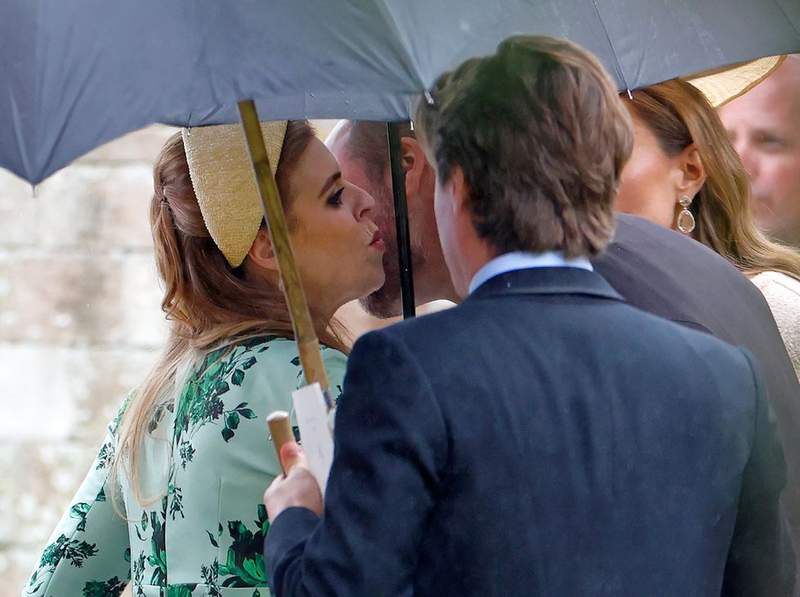 Image from: Beatrice and Eugenie's telling appearance at Peter Phillips's wedding despite storm surrounding them