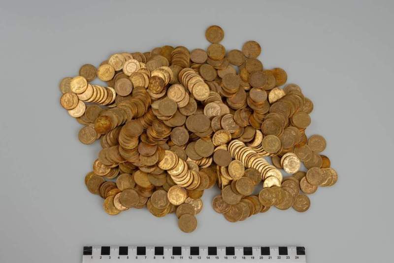 Image from: Two Hikers Found a Rusted Can in a Forest Packed With Nearly 600 Gold Coins Worth $330,000