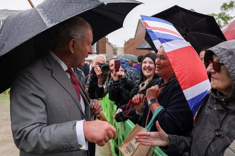 Image from: 'I have my uses': King jokes with schoolgirl who skipped maths class for royal visit