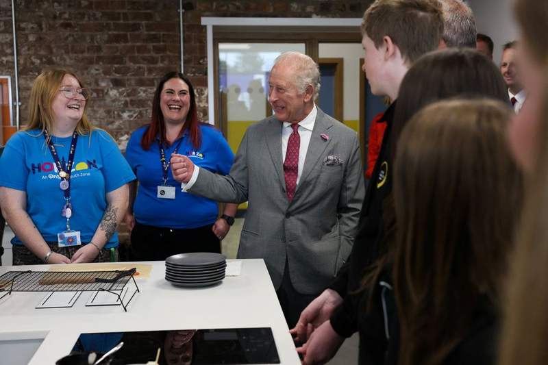 Image from: 'I have my uses': King jokes with schoolgirl who skipped maths class for royal visit