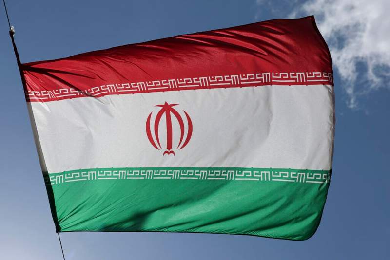 Image from: How the WC crowd reacted to Iran flag during USA vs. Paraguay opening ceremony