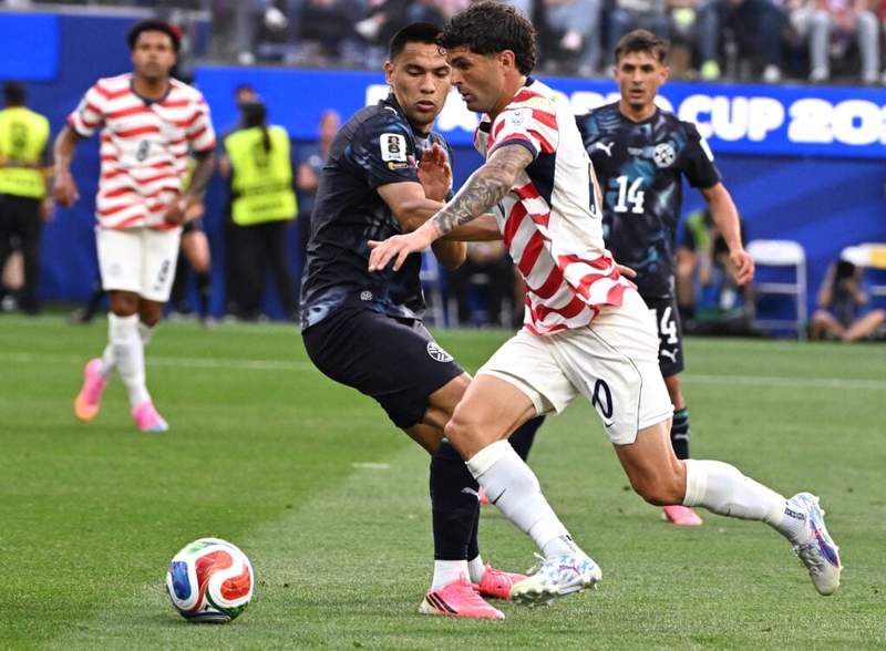 Image from: Why are so many players wearing pink boots at the World Cup?