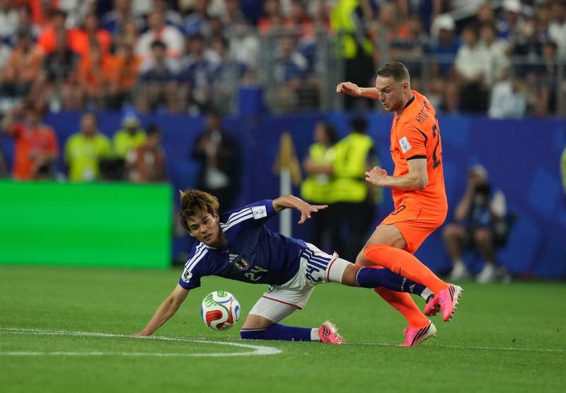 Image from: Japan come from behind twice to draw 2-2 with Dutch at World Cup