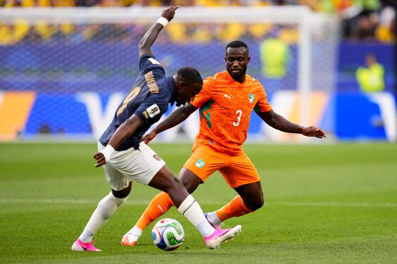 Image from: Ivory Coast celebrate World Cup return with late win over Ecuador