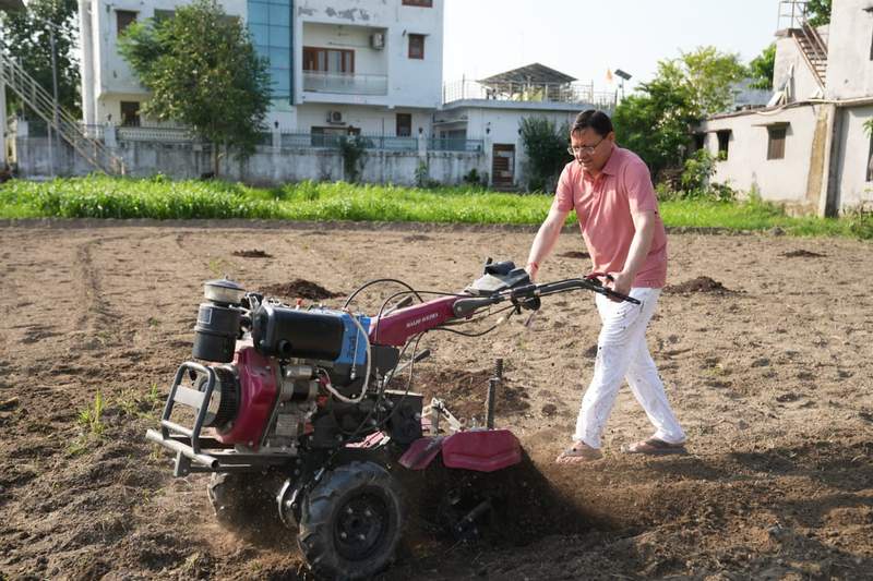 Image from: Uttarakhand CM Dhami promotes organic farming, ploughs field at private residence in Khatima