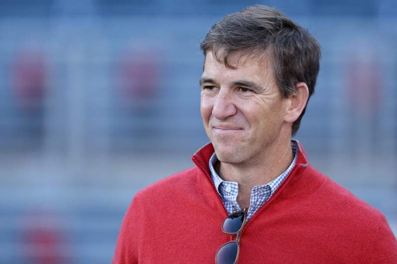 Image from: Former Giants QB Eli Manning spotted at old home stadium with son for France vs Senegal