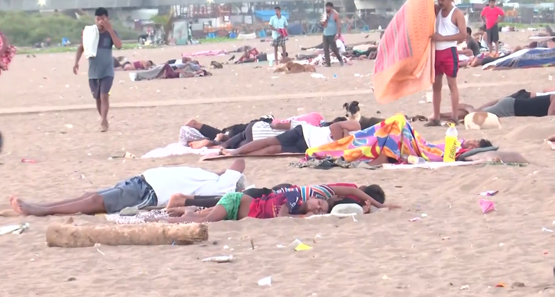Image from: Mumbai residents sleep on Versova beach to escape extreme heat