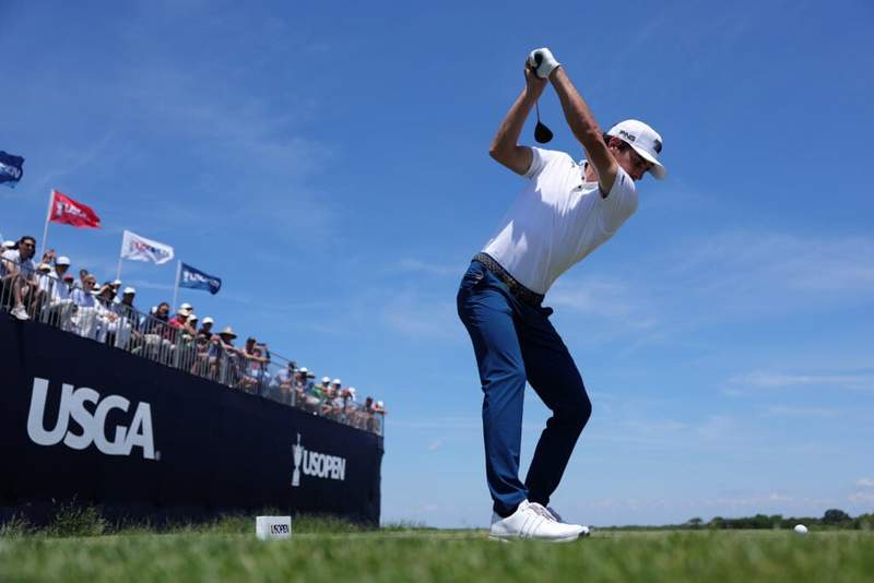 Image from: Andrew Coltart reacts to Joaquin Niemann being given two shot penalty for throwing a club at the US Open