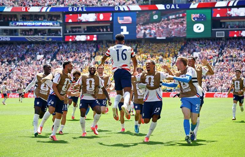 Image from: Referee goes down injured with cramp at World Cup - 'He needs the bucket and sponge'