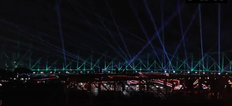 Image from: Howrah Bridge lights up ahead of International Yoga Day celebrations in Kolkata