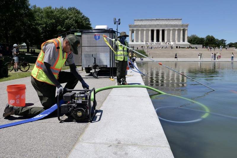 Image from: Olympian arrested after 'vandalising' Donald Trump's Reflecting Pool