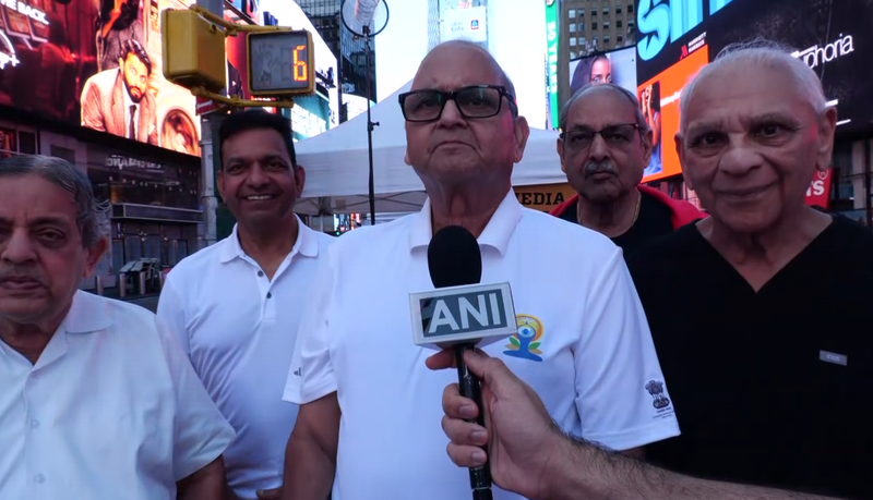 Image from: US: Om chants echo across Times Square in New York on International Yoga Day