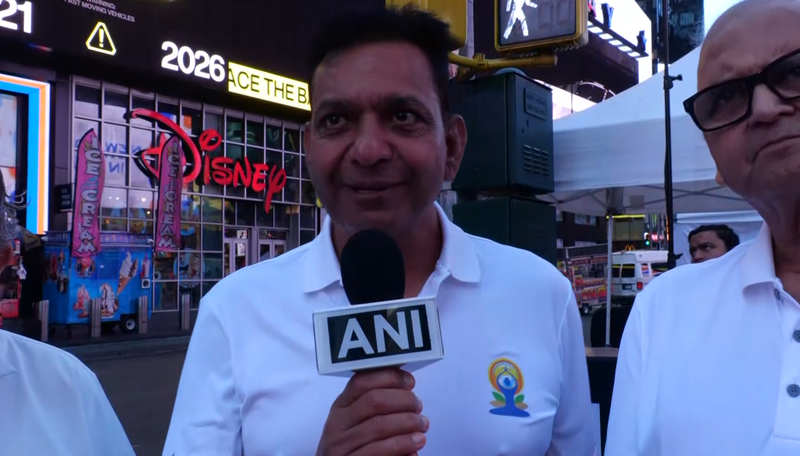 Image from: US: Om chants echo across Times Square in New York on International Yoga Day