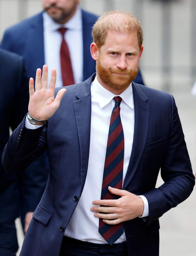 Image from: Meghan shares new photo of her children in tribute to Harry as Archie pictured wearing England top
