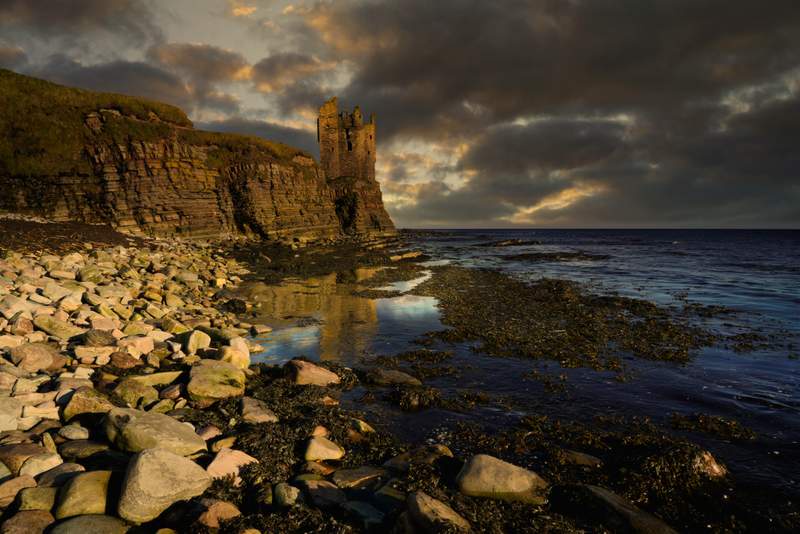 Image from: In the UK, perched on Scotland’s wild northern cliffs, this dramatic castle is slowly being claimed by the sea (you’ll have to hurry to see it!)