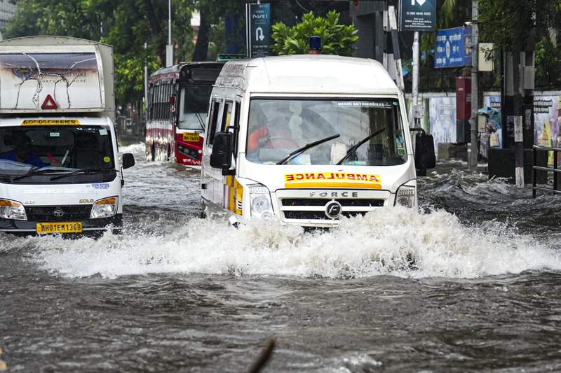 Image from: Monsoon onset drenches Mumbai; 200 mm rain in 24 hrs inundates low-lying areas, trains hit