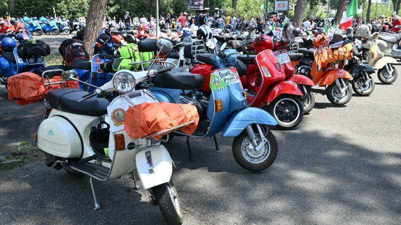 Image from: ‘Vespa is a way of life’: Thousands ride through Rome as Italy’s iconic scooter turns 80