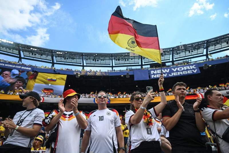 Image from: German soccer fan shows his love for American food after recent visit