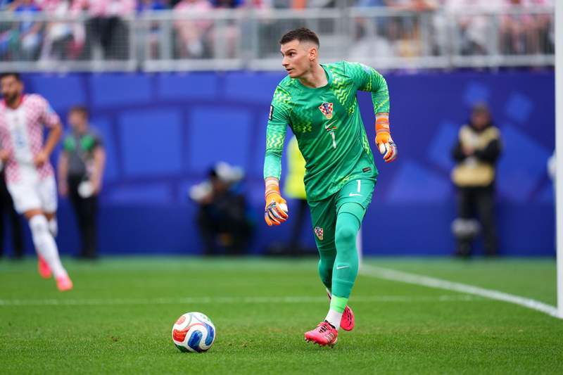 Image from: Croatia beat Ghana to join them in last 32, Kane's England win group