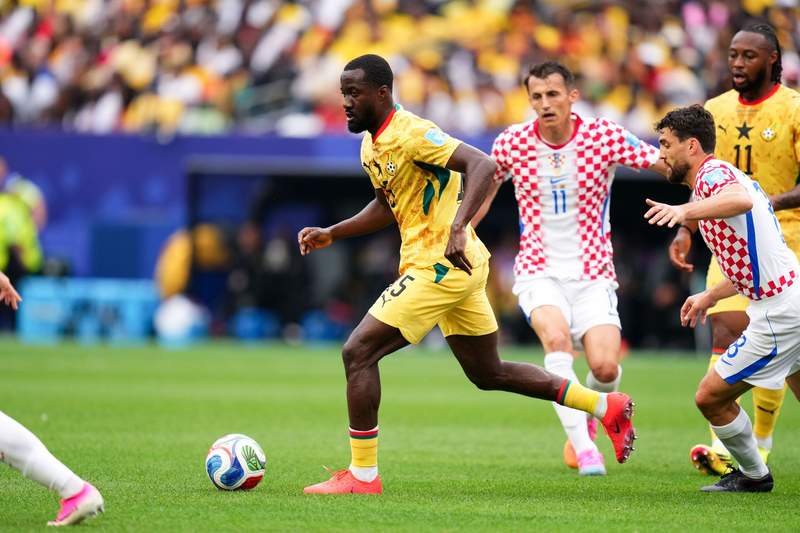 Image from: Croatia beat Ghana to join them in last 32, Kane's England win group