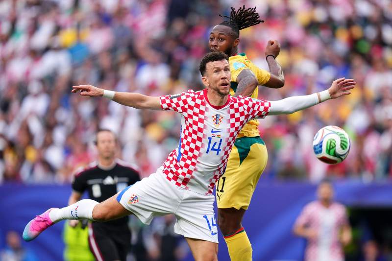 Image from: Croatia beat Ghana to join them in last 32, Kane's England win group