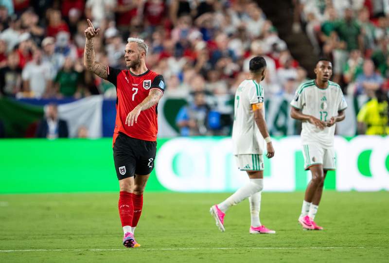 Image from: Austria and Algeria into knock-outs after dramatic draw