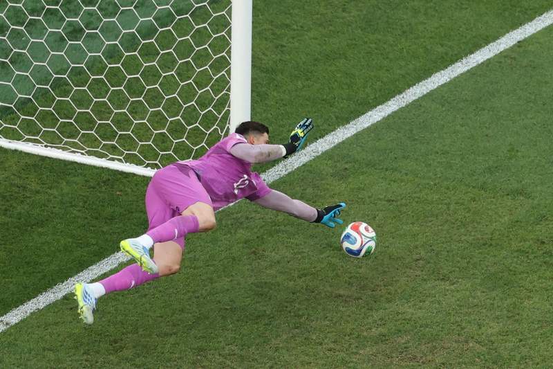 Image from: Dire Germany beaten on penalties by Paraguay after goal chalked off