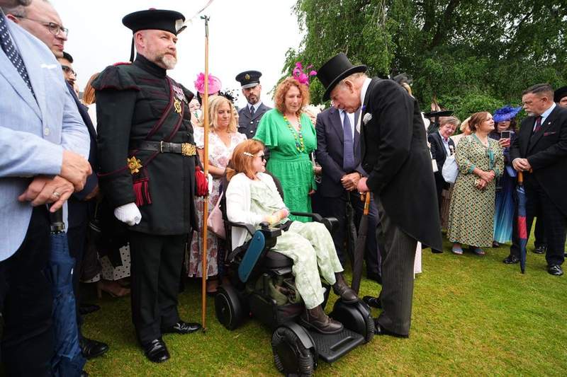 Image from: King and Queen meet Scottish footballing legend at Holyroodhouse garden party