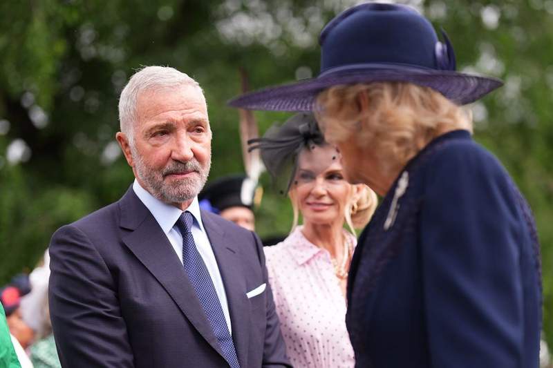 Image from: King and Queen meet Scottish footballing legend at Holyroodhouse garden party