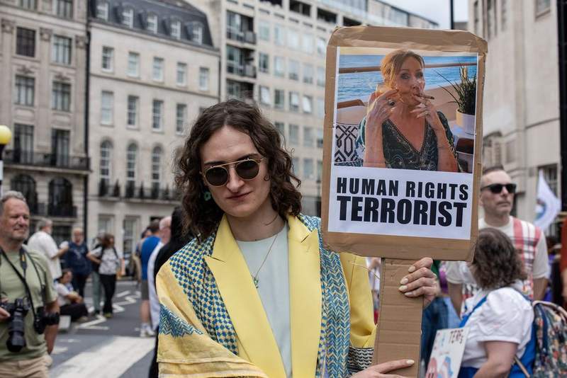 Image from: Palace faces online storm from trans activists after Queen's meeting with JK Rowling