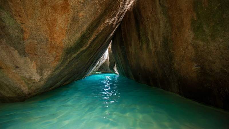 Image from: In the Caribbean, this beach is among one of the best beaches in the world with hidden caves (you’ll want to book a trip right away)