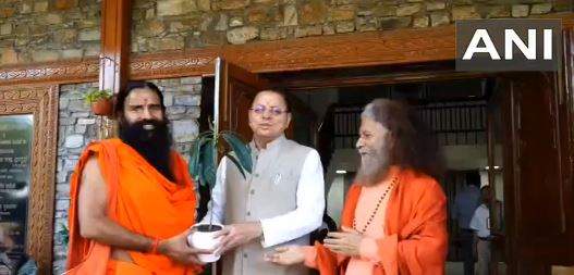 Image from: Film on Neem Karoli Baba announced, CM Pushkar Singh Dhami unveils poster