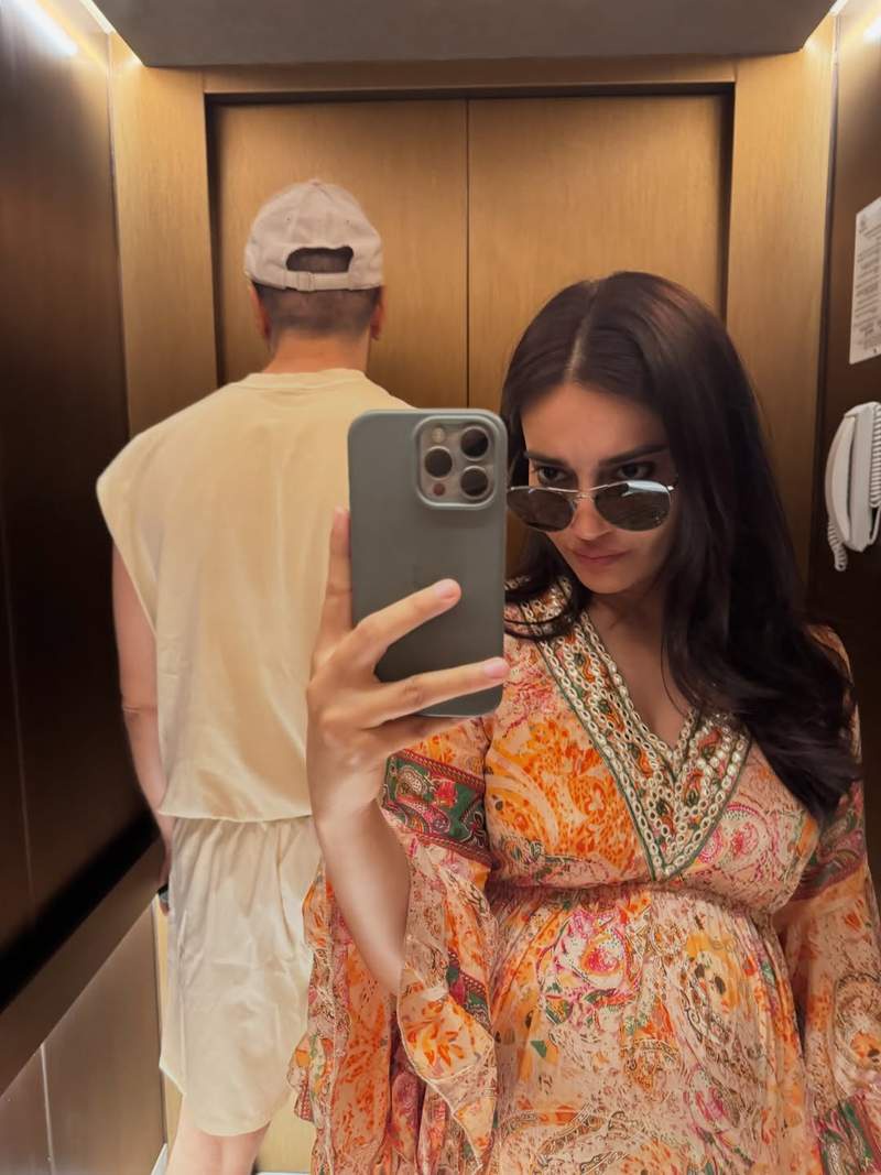 Image from: Surbhi Jyoti flaunts her baby bump in a flowy printed dress