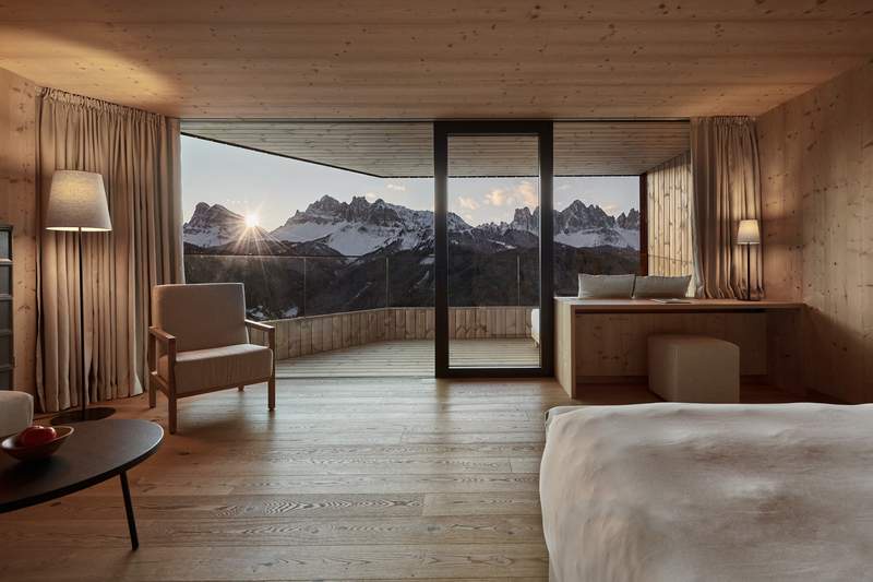 Image from: In the heart of the Dolomites, this hotel with an infinity pool offers one of the most breathtaking views of the Italian Alps