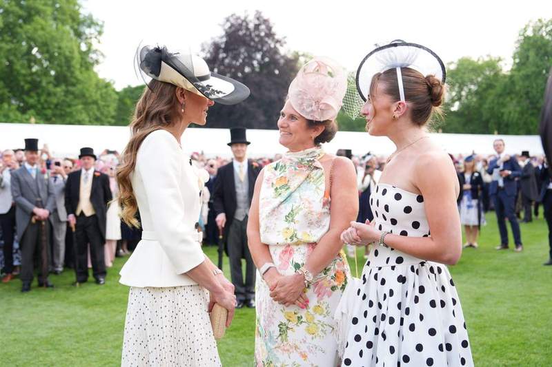 Image from: Catherine and Zara dazzle in stunning dresses at Buckingham Palace party