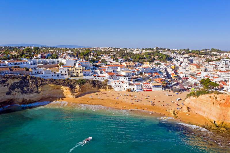 Image from: In the Algarve, this village nestled between cliffs and coves is one of the most spectacular in Portugal