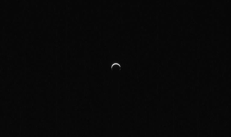 Image from: A Mars Crescent Captured by a Tiny Spacecraft Reveals Never-Before-Seen Details