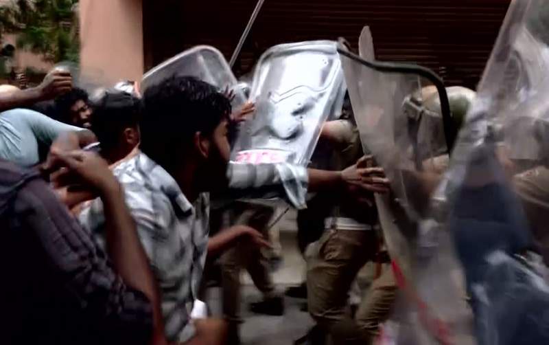 Image from: SFI breaches barricades, storms CAG office in Keralam protest over NEET-UG cancellation