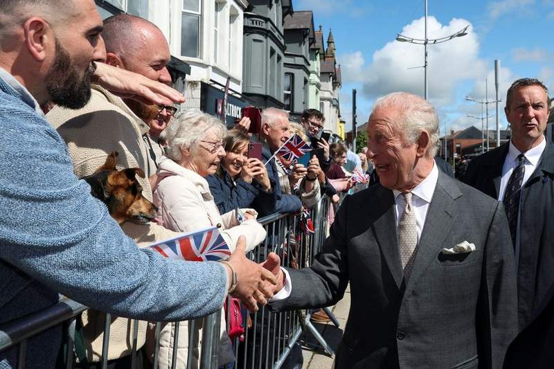 Image from: King Charles pooed on by bird during royal engagement: 'At least it didn't land on my head'