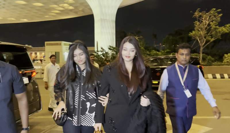 Image from: Aishwarya Rai Bachchan spotted at Mumbai airport with Aaradhya, likely heads to Cannes 2026