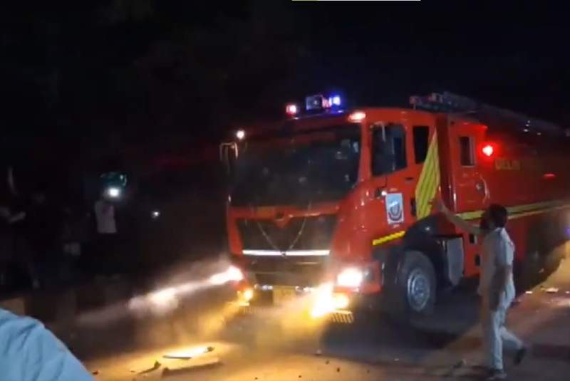 Image from: Delhi Shastri Park furniture market fire: Angry locals pelt stones at fire tenders over reported delay in initial response